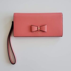 Kate Spade Wallet with adorable bow detail.  Barely used.
